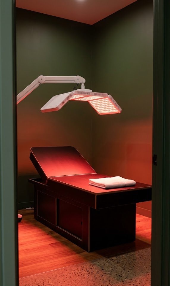 Medical-grade red light therapy panel in a private room at Based Aesthetics, Chennai